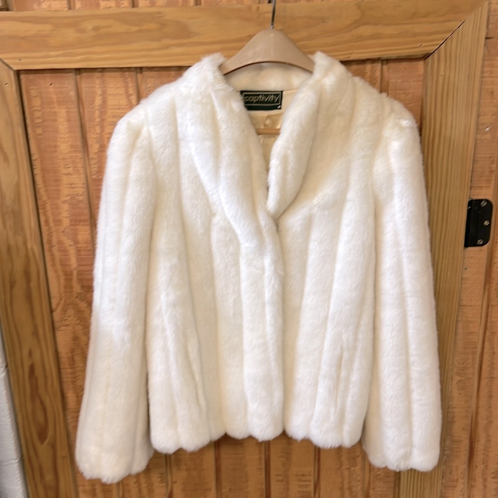 Cream colored Captivity fur coat